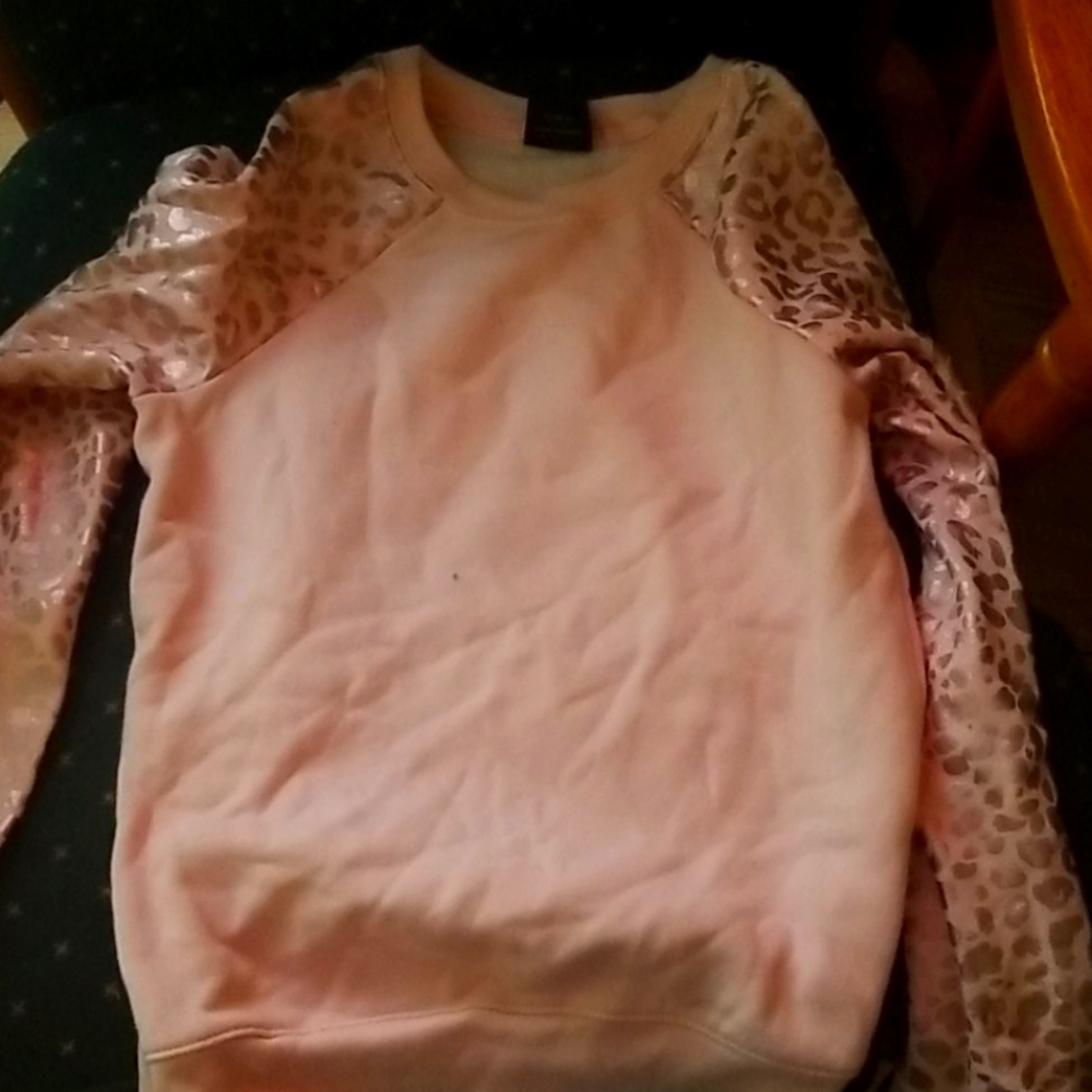 A pink sweater
